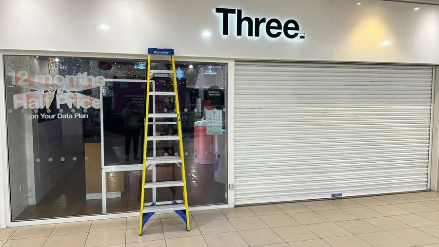 Retail security shutter fitted to a shopping-centre unit