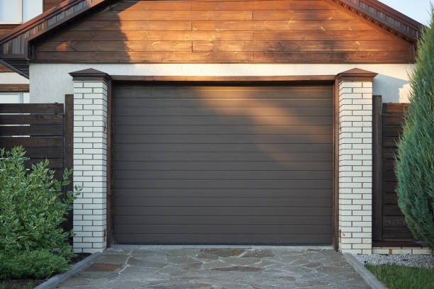 Anthracite sectional garage door on a smart detached home